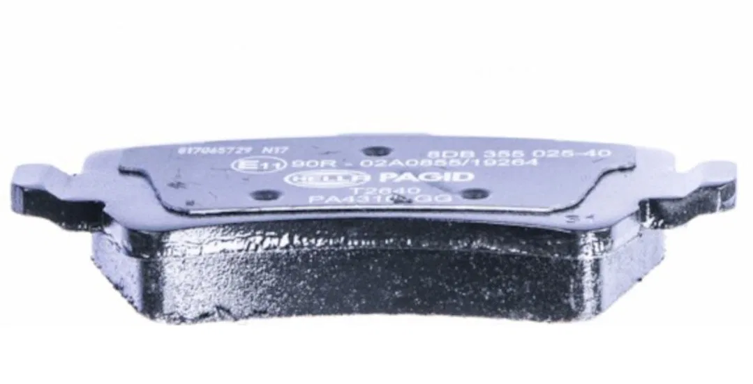 355025401 – HELLA Brake Pad, Low-Metallic Set Of 2 With Mounting Hardware